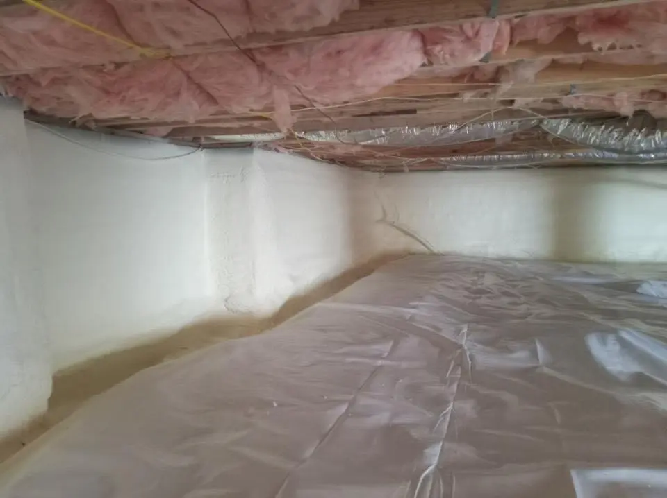 Crawl space encapsulation with closed-cell spray foam for Roof Maintenance in Clinton
